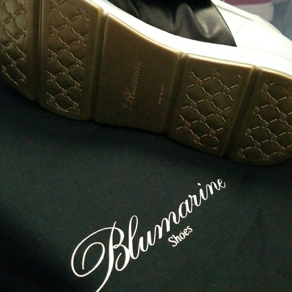 White/ black sneakers
